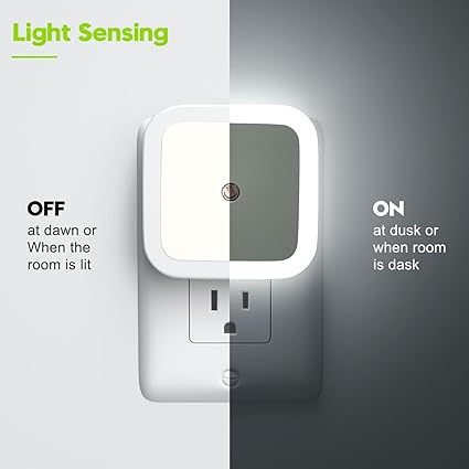 Light sensing wall plug with text indicating operational conditions
