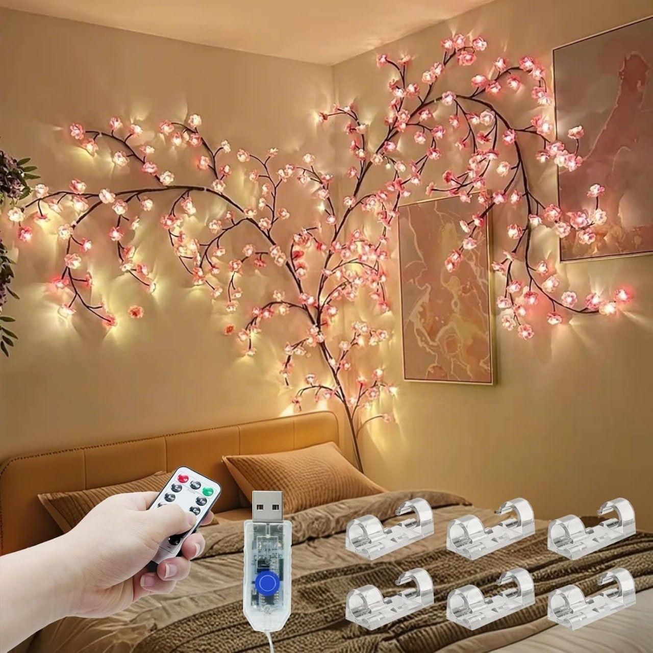 Decorative string lights with remote control on a bed in a bedroom setting.