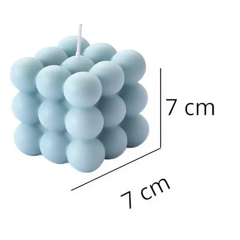 Blue bubble candle with dimensions labeled on a white background
